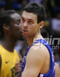 Big man Greg Slaughter makes his presence felt right away. Photo by Jerome Ascano