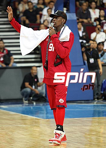 Dennis Rodman acknowledges his father Philander during the game. Photo by Jerome Ascano