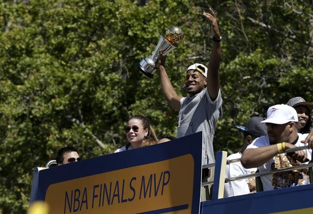 Golden State forward Andre Iguodala holds up the NBA Finals MVP trophy during the Warriors championship parade in Oakland. AP Golden State forward Andre Iguodala holds up the NBA Finals MVP trophy during the Warriors championship parade in Oakland. AP
