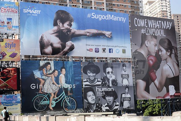 It's impossible to go anywhere in the metro these days without seeing an image of Pacquiao. Jaime Campos