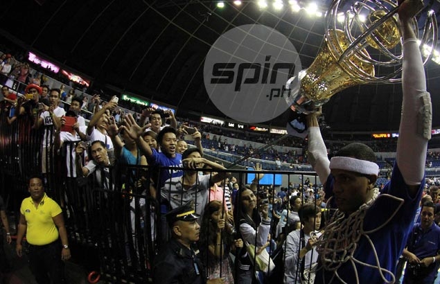 San Mig center Rafi Reavis brings home the bacon after a second successive championship - and sixth in an all-Filipino conference - for the Mixers. Jerome Ascano San Mig center Rafi Reavis brings home the bacon after a second successive championship - and sixth in an all-Filipino conference - for the Mixers. Jerome Ascano