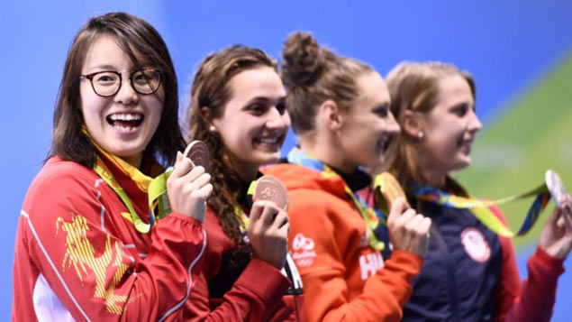 Chinese swimmer Fu Yuanhui wins public's heart for rare candor and wacky expressions in Rio