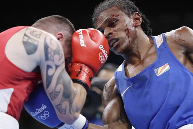 Olympic boxers torn in fighting without headgear as Rio boxing riddled with bloody fights