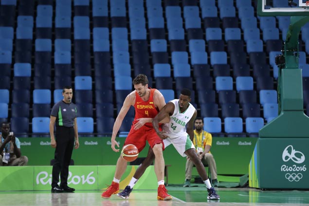 Spain survives bomb scare, avoids upset ax vs Nigeria as Gasol, Rubio lead late rally