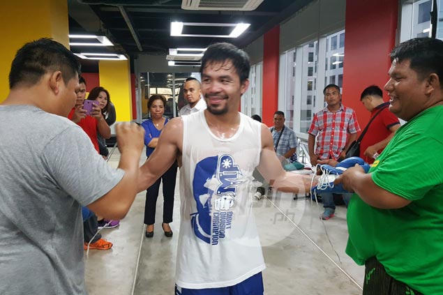 Pacquiao never too tired for boxing training, hoops after tension-filled Senate hearing