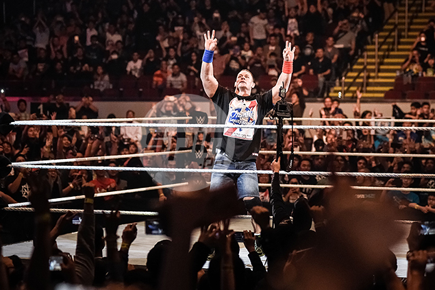 Pinoy wrestling fans enjoy a night to remember in WWE Live Manila. See ...