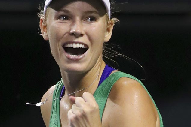 Top seed Caroline Wozniacki breezes past Petra Martic and into Auckland quarters