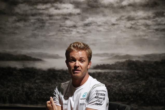 Tension brews between Rosberg, Hamilton as tight title race resumes in stormy Malaysian GP