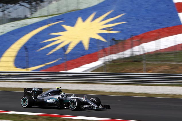 Nico Rosberg takes lead in first Malaysian GP practice despite bizarre Renault fire