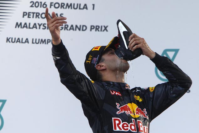 Nine Aussies arrested after scandalous stripping stunt at Malaysian Grand Prix