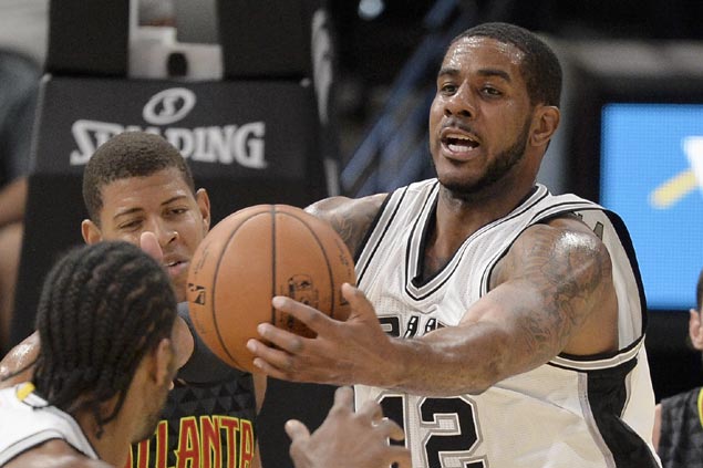 Aldridge says he's happy in San Antonio, denies trade rumors that he won't end season with Spurs