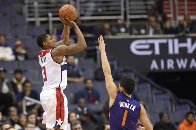 Beal drops career-high 42, Wall comes up clutch as backcourt duo carry Wizards past Suns