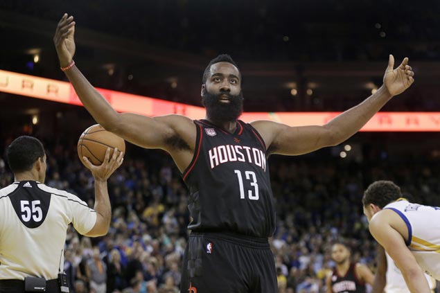 Rockets end Warriors' 12-game win streak by holding ground in two-overtime thriller