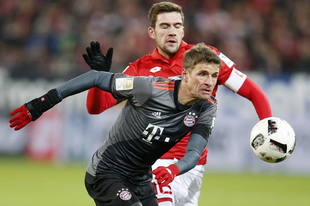 Bayern Munich takes provisional lead on goal difference with victory at Mainz