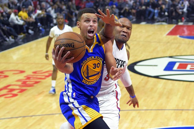 Curry, Durant fire blanks but Warriors turn to defense to clobber Clippers for third win in a row
