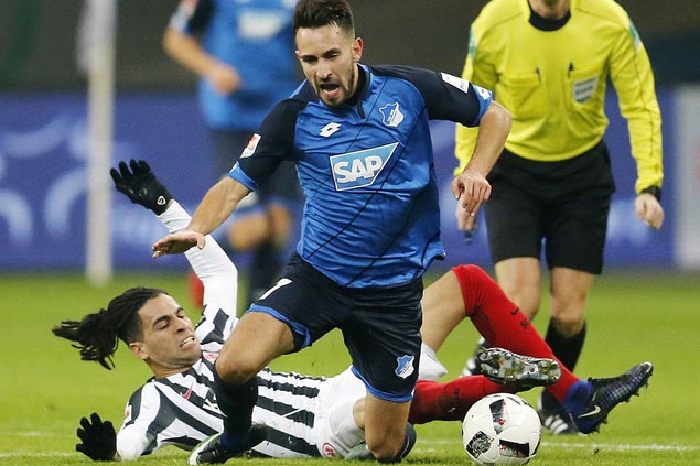 Hoffenheim keeps unbeaten record, battles Eintracht to scoreless draw in ill-tempered match