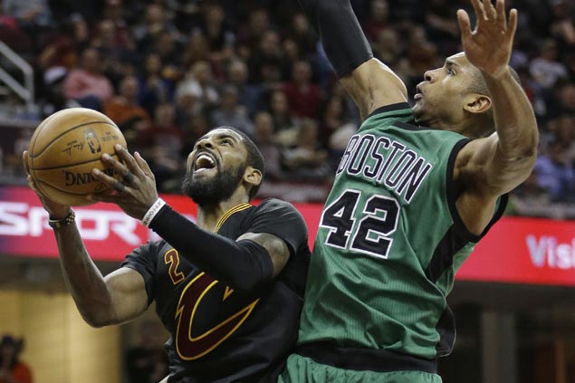 Kevin Love catches fire early, Kyrie Irving takes charge late as Cavs survive furious Celtics rally