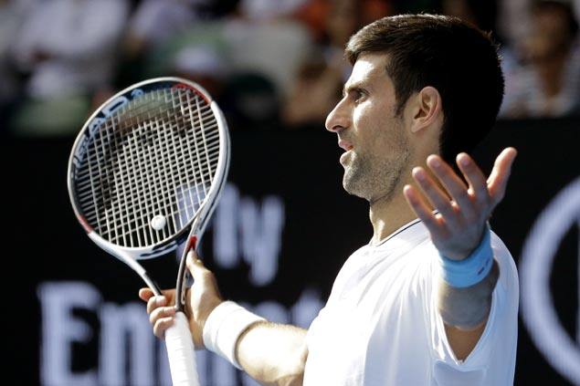 Defending champ Novak Djokovic falls to wildcard Denis Istomin in second round of Aussie Open