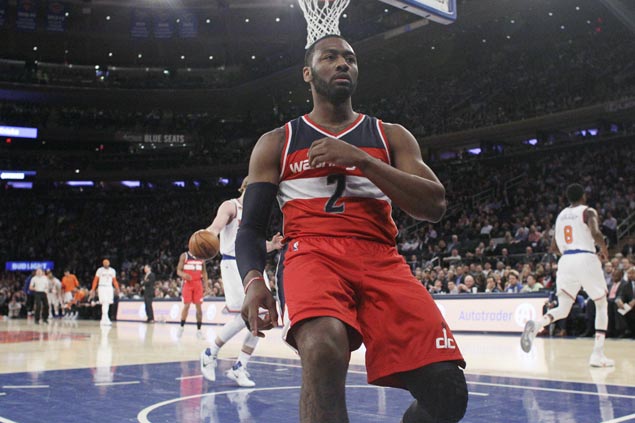 John Wall rescues Wizards from late-game collapse to stun Knicks for fourth straight win