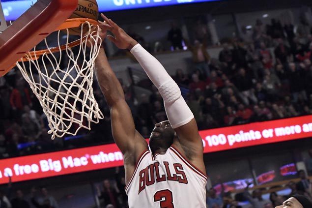 Dwyane Wade steady in fourth as Bulls down Kings and spoil DeMarcus Cousins' 42-point night