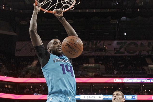 Hornets use balanced offense to survive late scare from Nets