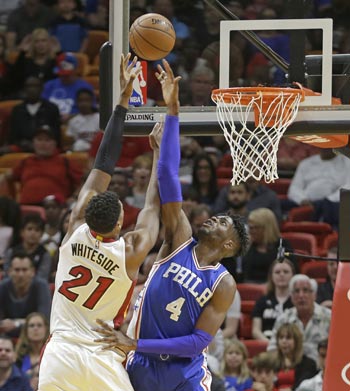 Heat win run now at 10 as Hassan Whiteside has 30-20 performance in rout of struggling Sixers