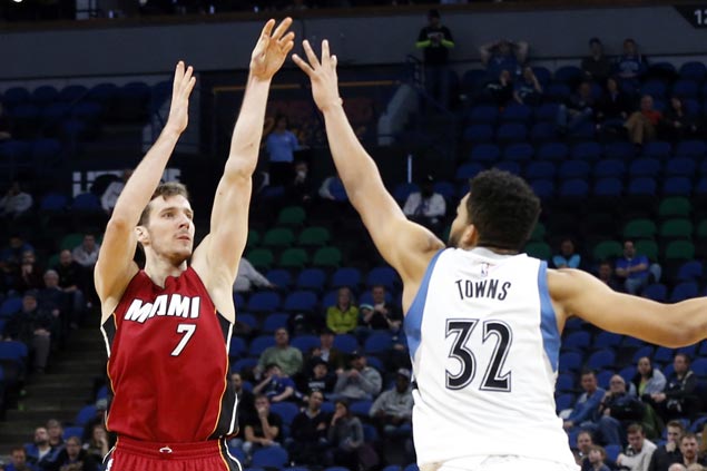 Goran Dragic hits career-high seven triples as Heat down Wolves and extend win run to 11