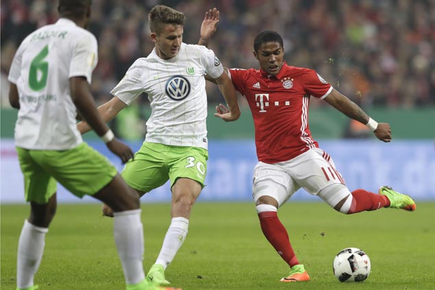 Bayern Munich scrapes past Wolfsburg and into German Cup quarterfinals