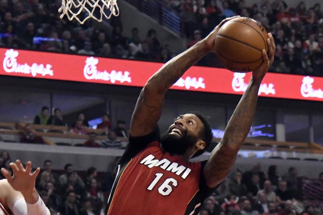 James Johnson takes charge as Heat beat Nets to extend win run to 13