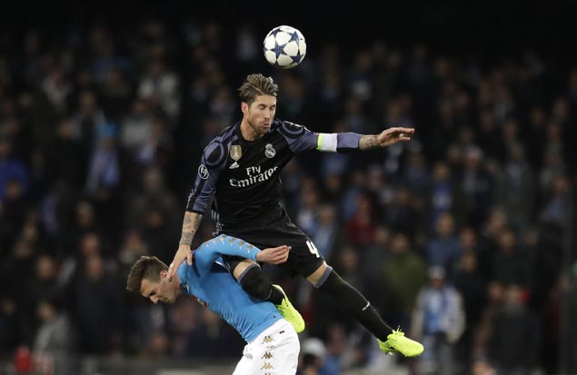 Titleholder Real Madrid marches on to Champions League quarters after early scare from Napoli