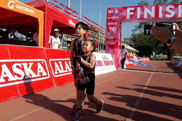 Kids stuff as ultramarathoner mom keeps triathlon fun for her two pride and joy