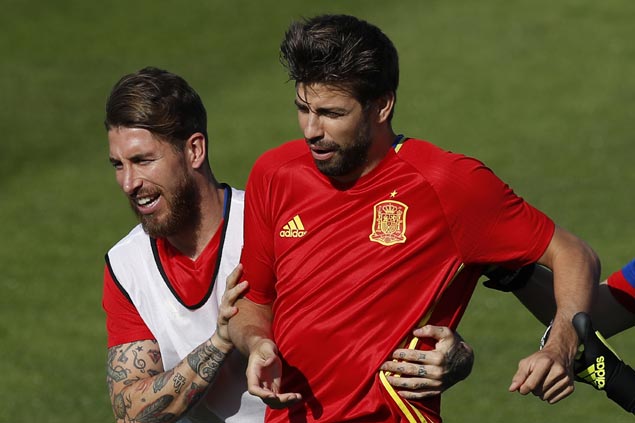 Rivals turned Spain teammates Sergio Ramos, Gerard Pique call truce on word war