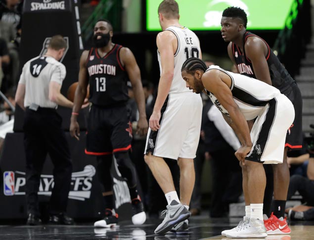 Badly bruised and beaten, Spurs are down but not out