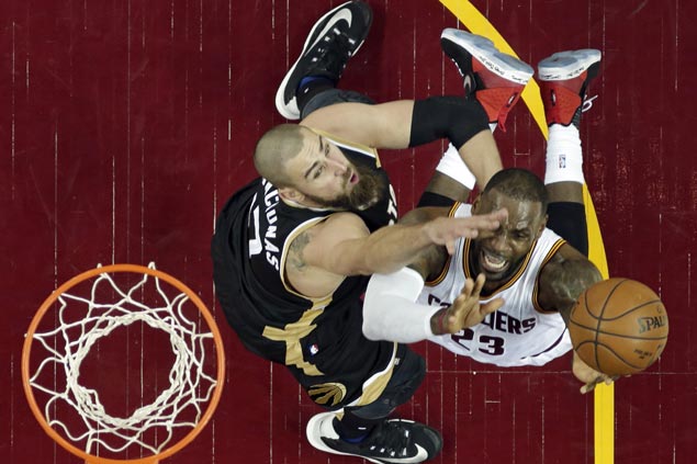 LeBron James bucks slow start to notch another milestone as hot-shooting Cavs sink Raptors to 2-0 hole