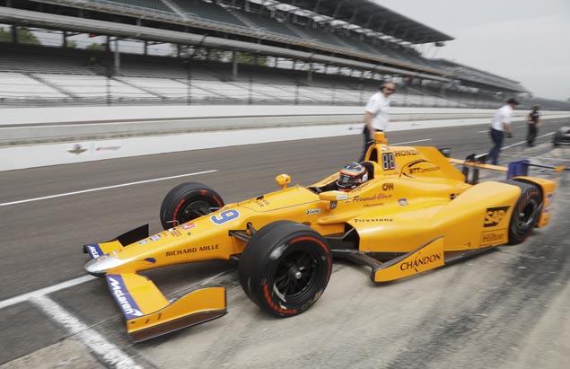 Ed Carpenter takes top spot, Fernando Alonso secures place in pole shootout after crash-marred Indy 500 qualifying
