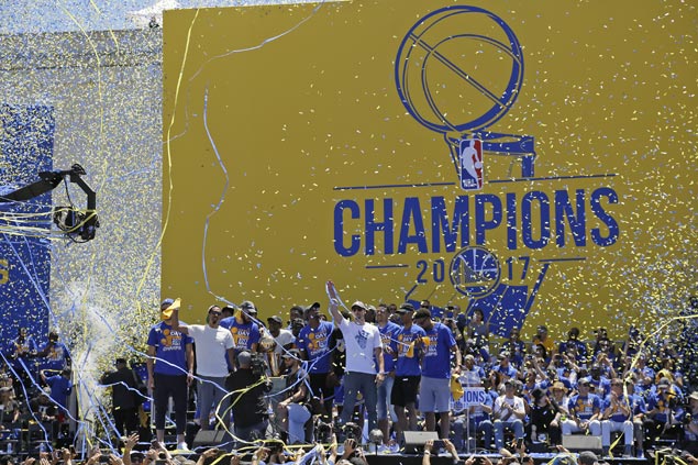 Warriors savor return to NBA throne with grand championship parade through Oakland