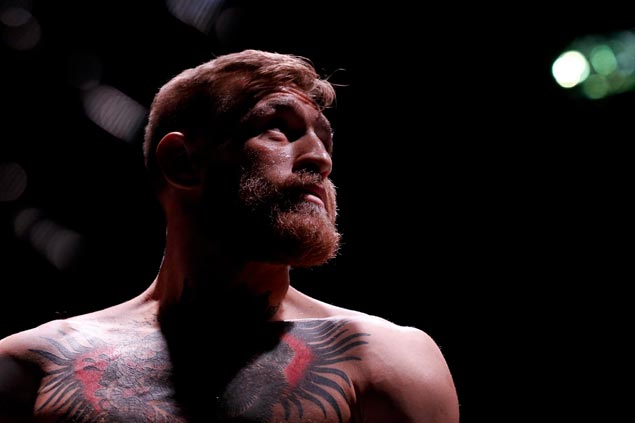 White assures McGregor UFC comeback this year, strips inactive star of lightweight title