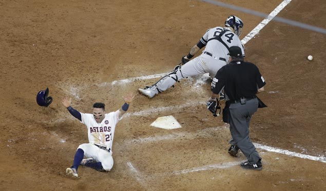 Astros move two games ahead of Yankees in ALCS as Jose Altuve scores on Carlos Correa ninth-inning double