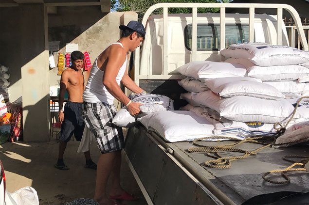 LOOK: June Mar Fajardo does offseason heavy lifting in dad's feeds business