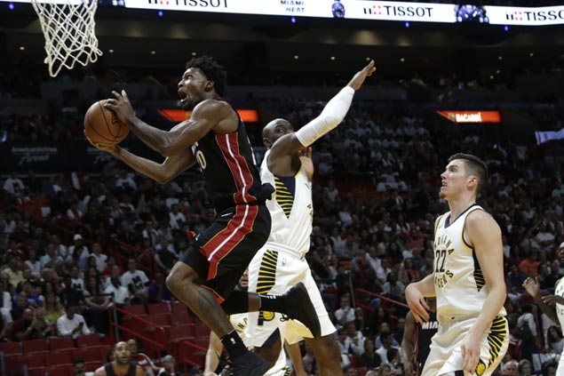 Heat blow huge lead but hang on to beat Pacers