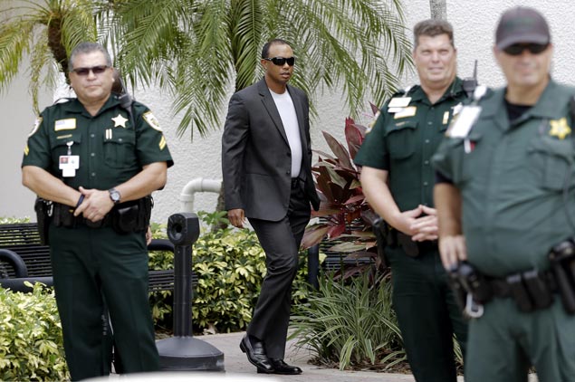 Tiger Woods avoids jail after pleading guilty to reckless driving