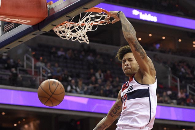 Balanced offense powers Wizards to victory over Kings