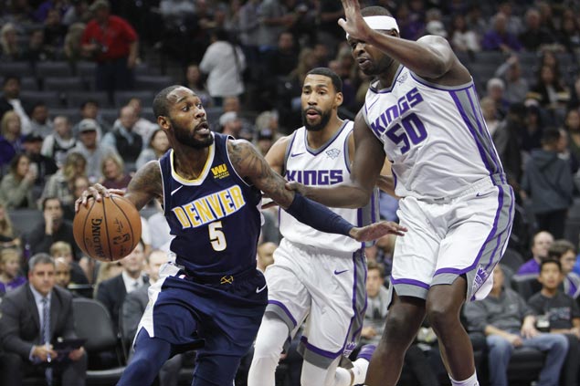 Missing coach and two starters, Nuggets manage to beat Kings and get back on track