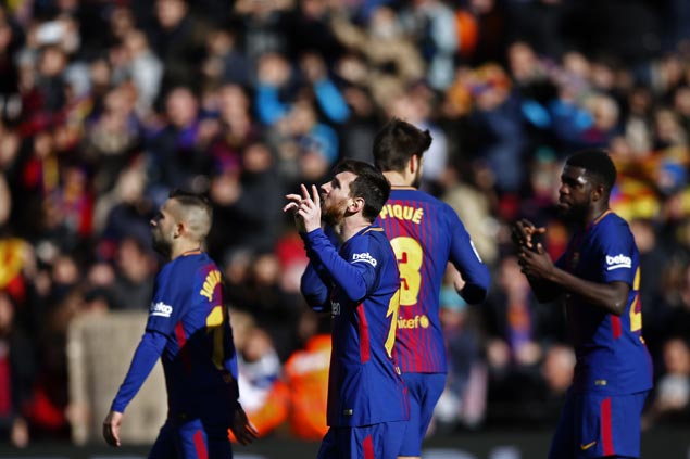 Valencia fails to close gap on La Liga leader Barcelona after loss to 10-man Getafe