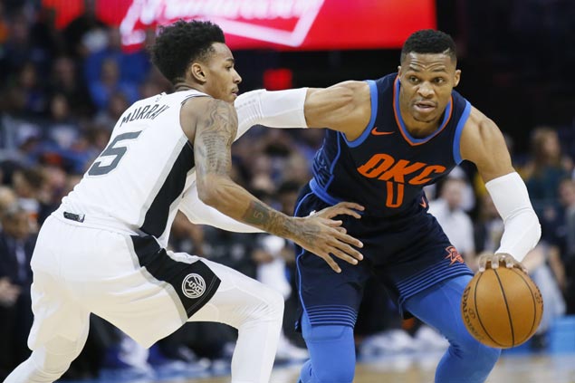 Westbrook's triple-double, clutch three lift Thunder in squeaker over shorthanded Spurs
