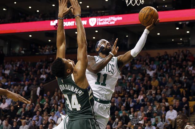 Tatum sizzles early, Irving takes charge late as surging Celtics snap Bucks three-game win run