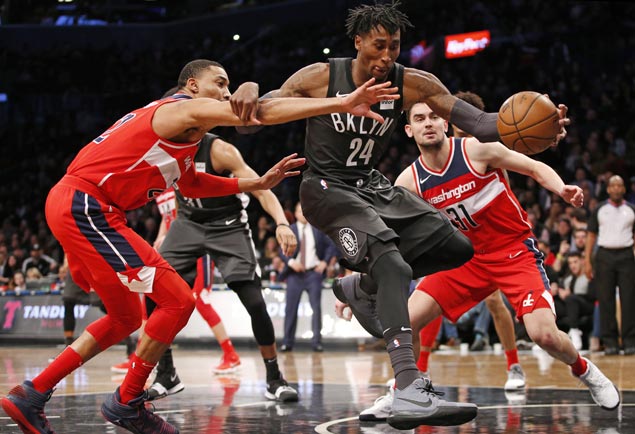 Nets blow double-digit lead but pounce on late Wizards error to save victory