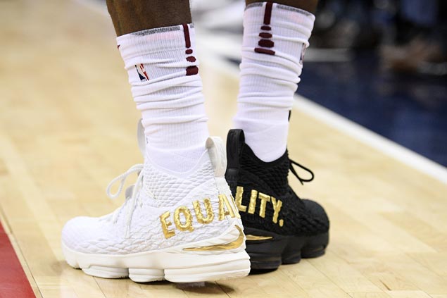 LeBron James makes statement on equality with one black shoe, one white shoe