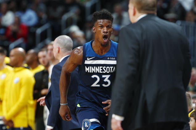 Jimmy Butler takes charge late as Timberwolves rally from 14 points down to stun Nuggets