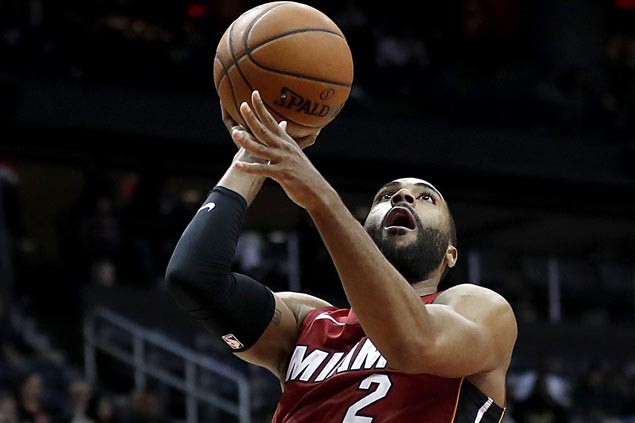 Heat catch fire in fourth to get back on winning track and deal Magic ninth straight loss